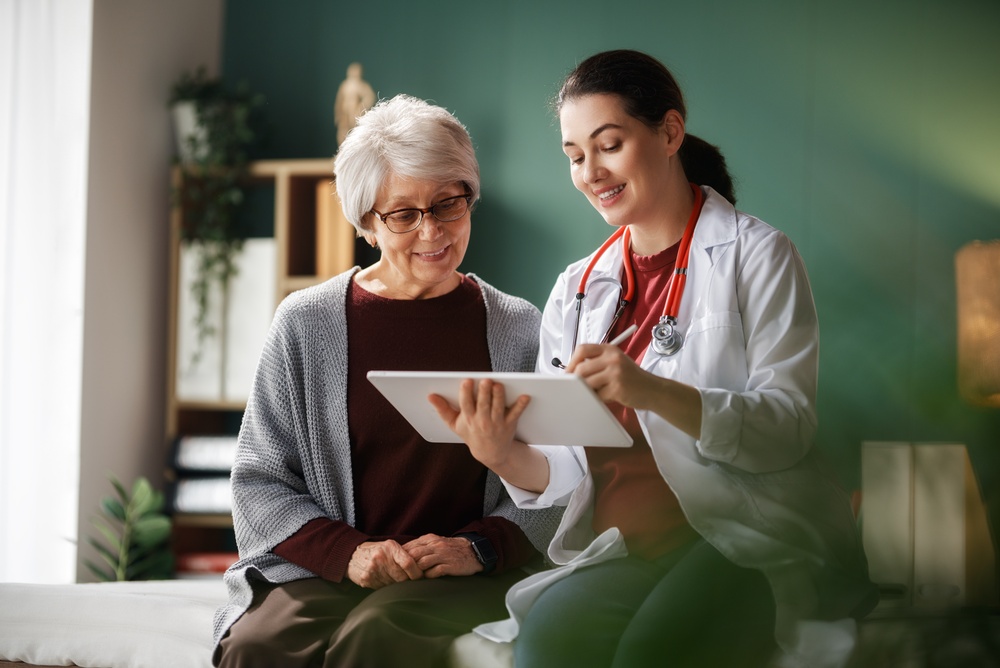 Nurse attending to a female senior